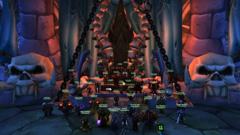 The raid gathered before a towering doorway decorated with skulls and chains.