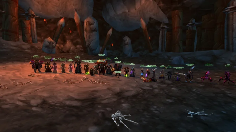 The raid lined up inside a cavern beneath an arched passage.