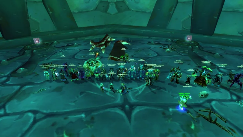 Guild members assembled in a green-lit raid chamber.